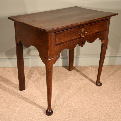A Small George III Oak Lowboy