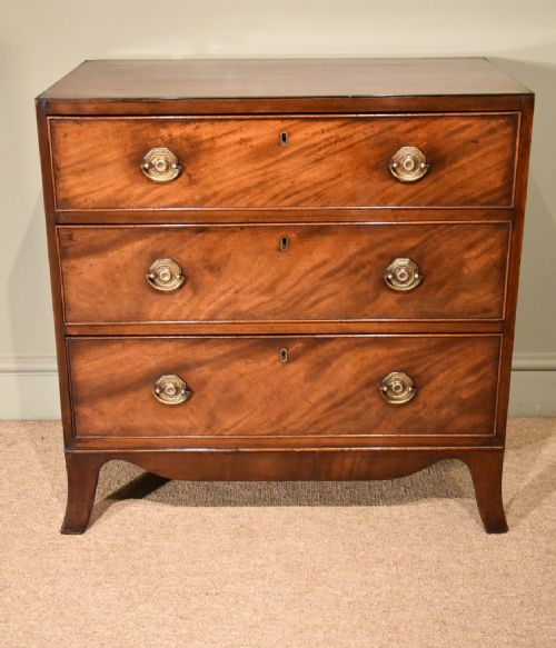 A Small Regency Period Mahogany Chest of Three Drawers
