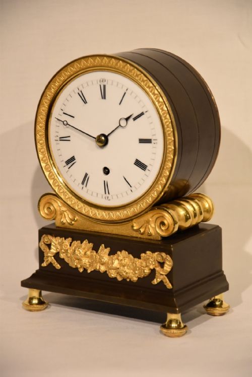 An English Regency Bronze and Ormolu Mantel Clock