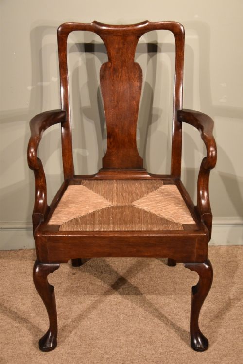 fig 1. An Attractive Set of Eight George II Oak Dining Chairs