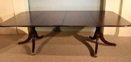 A Superb Regency Two Pillar Dining Table