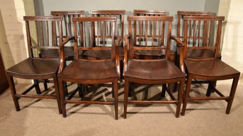 An Elegant Set of Eight Country Mahogany Dining Chairs