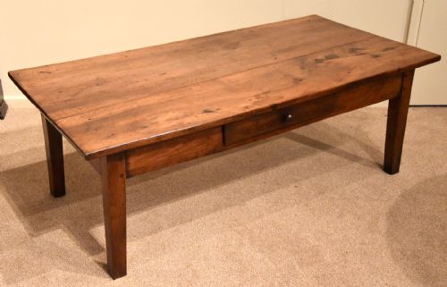 A Walnut Wood French Breton Coffee Table