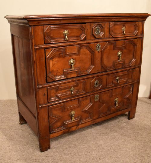 An Attractive Late 17th Century Cherry Wood Carved Chest of Drawers