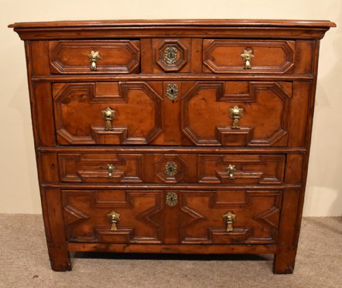 fig 1. An Attractive Late 17th Century Cherry Wood Carved Chest of Drawers