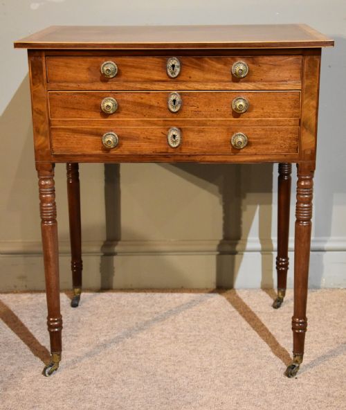 An Early 19th Century Mahogany and Inlaid Work Table