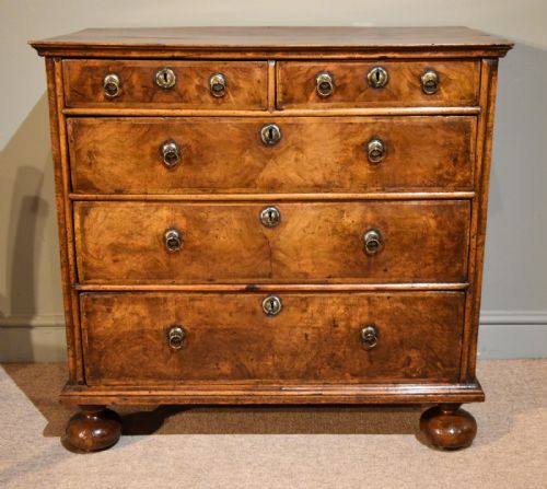 A Delightful Queen Anne Period Walnut Chest of Drawers