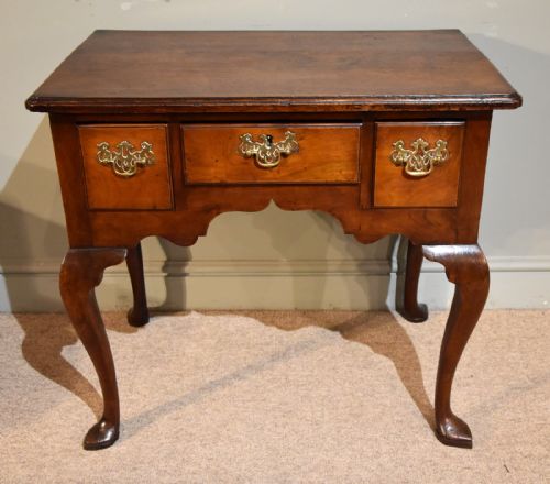 A Country Walnut Late George II Lowboy