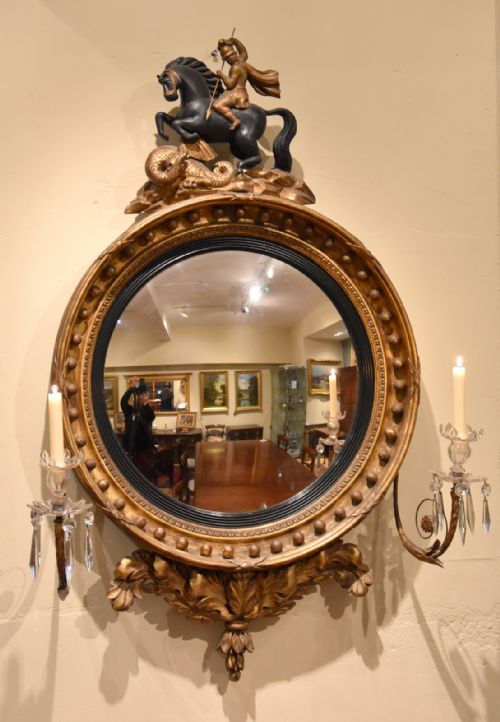 An Elegant Regency Giltwood Convex Mirror