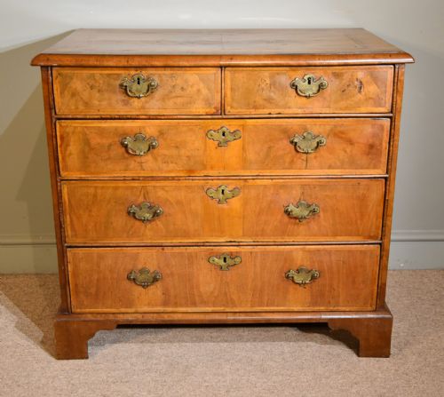 An Elegant George I Walnut Veneered Chest of Drawers