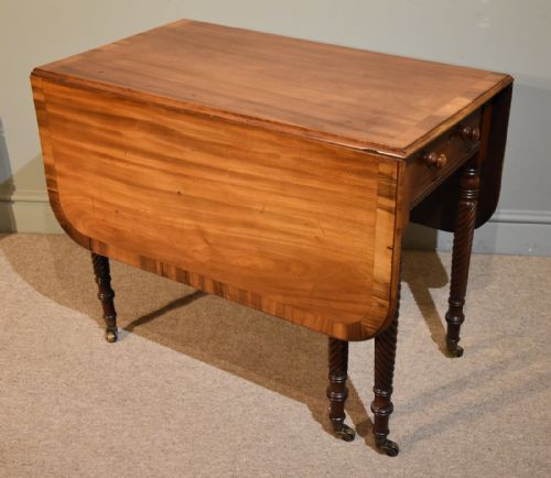 An Elegant Regency Period Drop Leaf Table