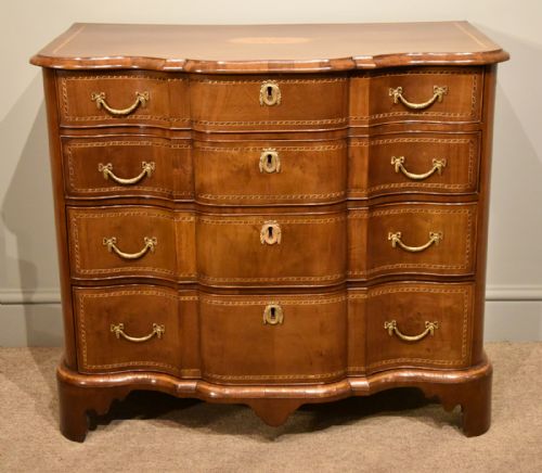 A Fine Dutch Mahogany Inlaid Breakfront Chest of Drawers