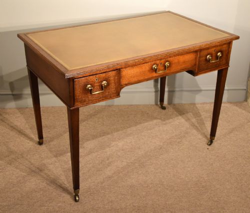 An Elegant 19th Century Oak Writing Table