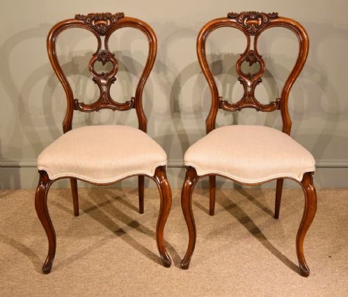 A Fine Quality Pair of Solid Walnut 19th Century Side Chairs
