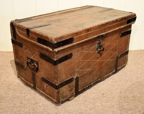 A MID 19TH CENTURY LEATHER AND IRON BOUND TRUNK - ADDITIONAL PHOTO 3