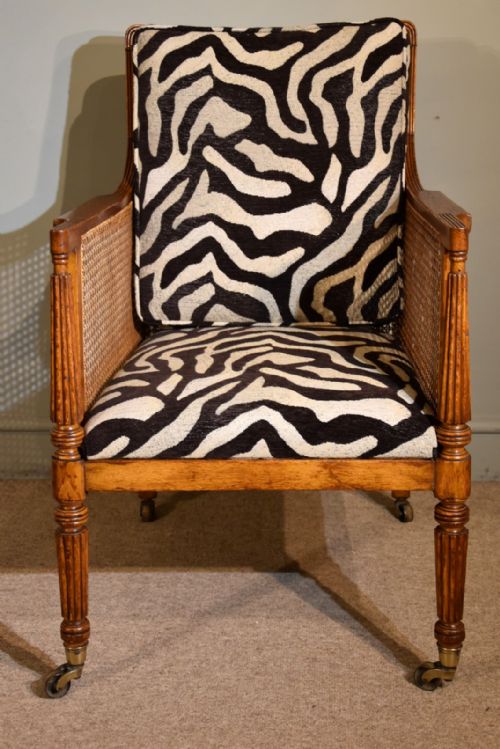 regency period oak bergere armchair - CATEGORY: ANTIQUE CHAIRS - DATED 19TH CENTURY