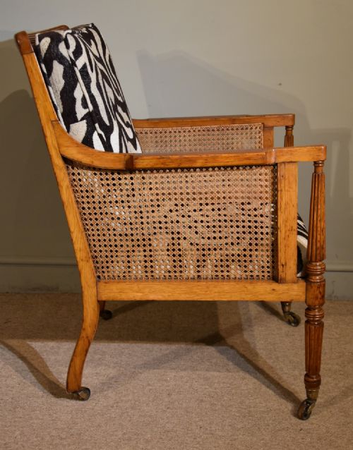 REGENCY PERIOD OAK BERGERE ARMCHAIR - ADDITIONAL PHOTO 3