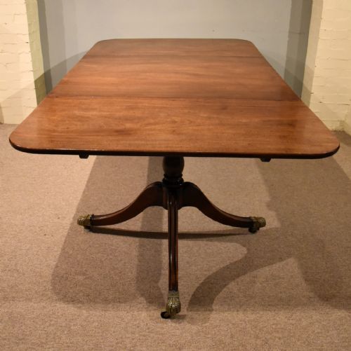 REGENCY PERIOD MAHOGANY TWO PILLAR DINING TABLE - ADDITIONAL PHOTO 1