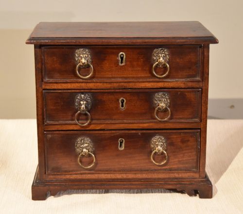 a miniature mahogany chest of drawers - CATEGORY: ANTIQUE CHEST OF DRAWERS - DATED 1800