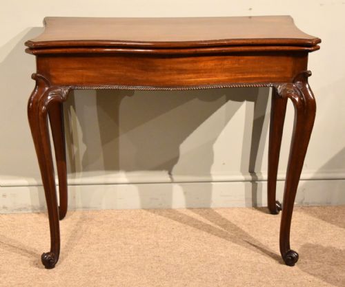 18th century mahogany serpentine carved card table - CATEGORY: ANTIQUE TABLES - DATED 18TH CENTURY