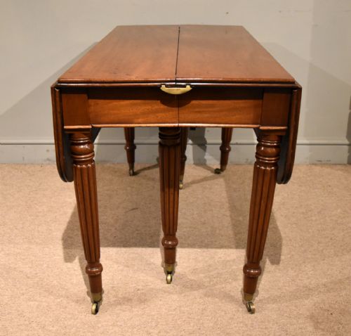REGENCY PERIOD MAHOGANY CONCERTINA ACTION DINING TABLE - ADDITIONAL PHOTO 1