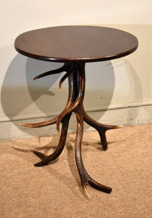 antler tripod table with mahogany top - CATEGORY: ANTIQUE  - DATED 1930