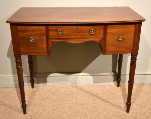 regency mahogany bowfront dressingwriting table - CATEGORY: ANTIQUE TABLES - DATED REGENCY
