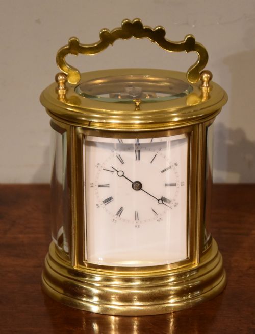 oval striking carriage clock - CATEGORY: ANTIQUE CLOCKS - DATED 19TH CENTURY