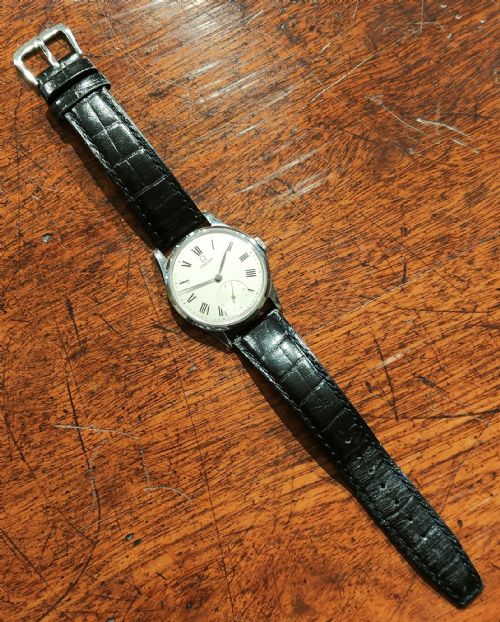 MID 20TH CENTURY STEEL OMEGA WRISTWATCH BLACK LEATHER STRAP - ADDITIONAL PHOTO 1