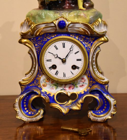 FRENCH STRIKING PORCELAIN MANTEL CLOCK - ADDITIONAL PHOTO 1