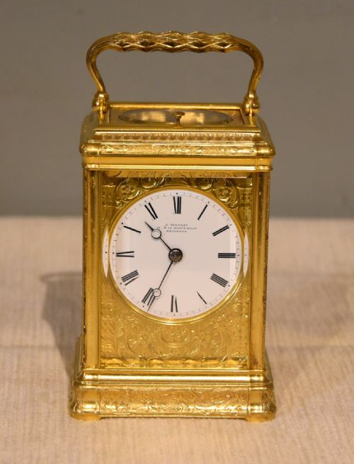 an engraved gorge cased carriage clock - CATEGORY: ANTIQUE CLOCKS - DATED 19TH CENTURY