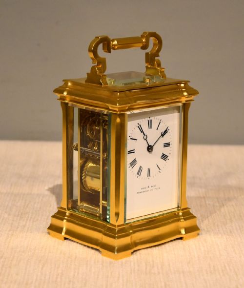 A STRIKING CARRIAGE CLOCK - ADDITIONAL PHOTO 1