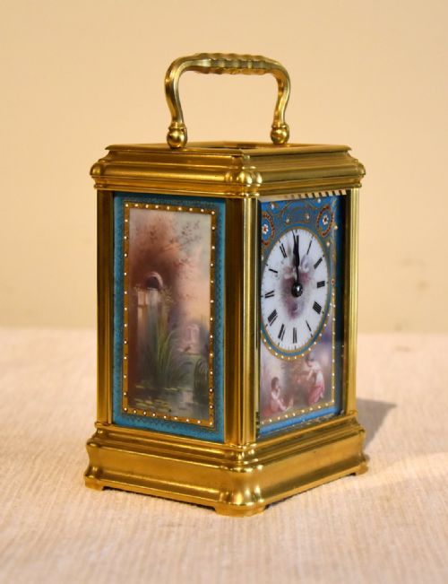 A PORCELAIN MOUNTED CARRIAGE CLOCK - ADDITIONAL PHOTO 1