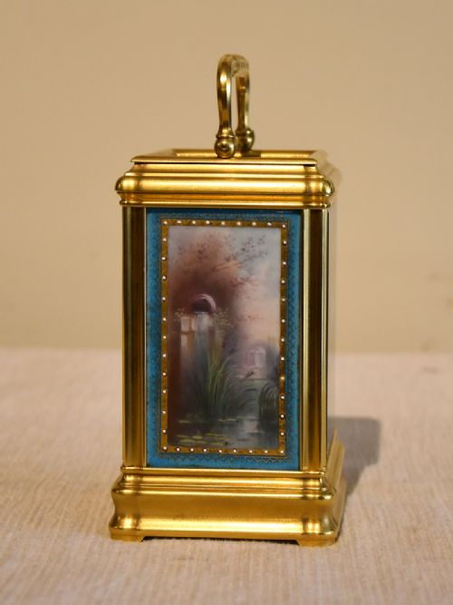 A PORCELAIN MOUNTED CARRIAGE CLOCK - ADDITIONAL PHOTO 2