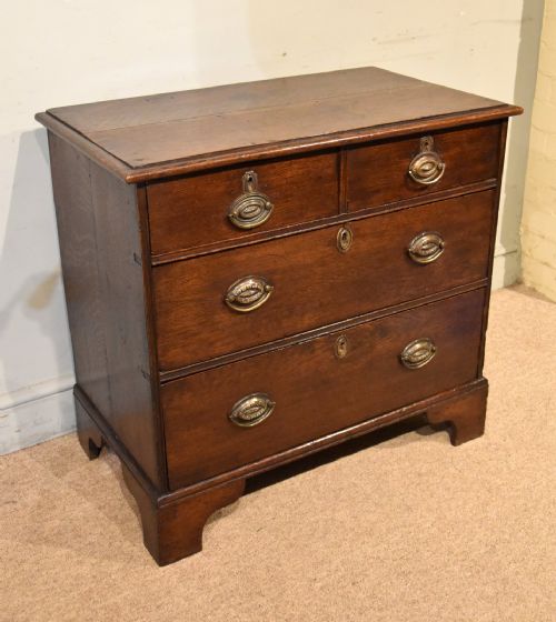 GEORGE III COUNTRY OAK CHEST OF DRAWERS - ADDITIONAL PHOTO 1