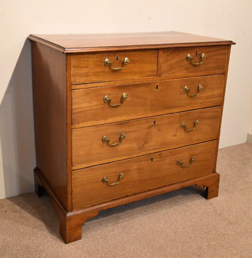 GEORGE III FADED MAHOGANY CHEST OF DRAWERS - ADDITIONAL PHOTO 1