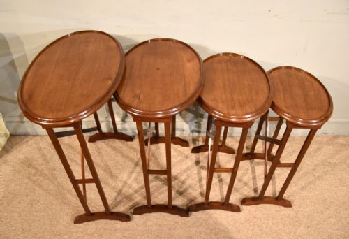 EDWARDIAN NEST OF FOUR TABLES OF OVAL SHAPE - ADDITIONAL PHOTO 1