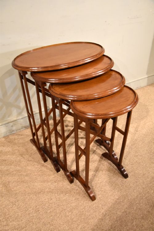 EDWARDIAN NEST OF FOUR TABLES OF OVAL SHAPE - ADDITIONAL PHOTO 4