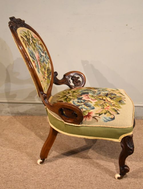 EARLY VICTORIAN CARVED WALNUT PARLOUR CHAIR - ADDITIONAL PHOTO 4