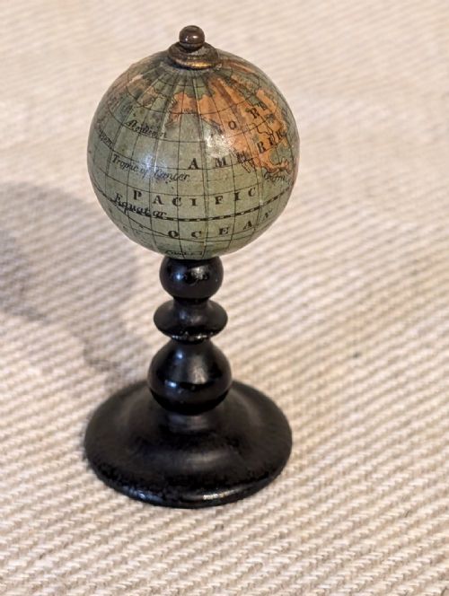 A SMALL 19TH CENTURY EBONY TERRESTRIAL GLOBE - ADDITIONAL PHOTO 2