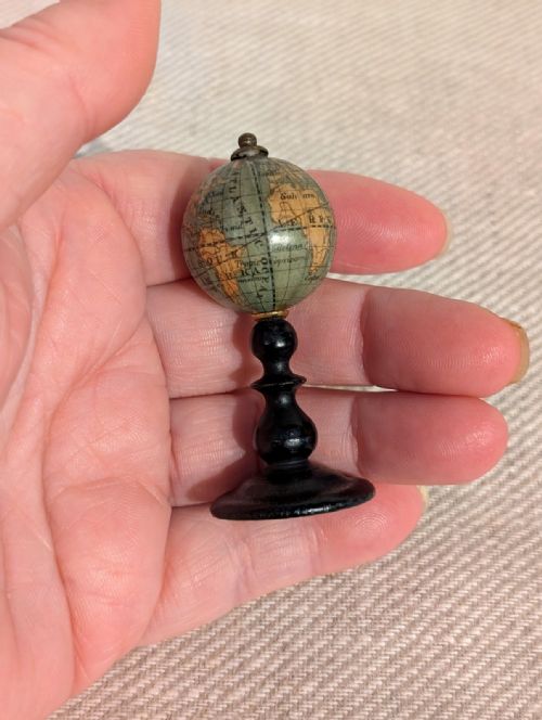 A SMALL 19TH CENTURY EBONY TERRESTRIAL GLOBE - ADDITIONAL PHOTO 3