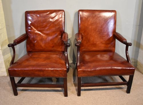 GEORGE III STYLE MAHOGANY GAINSBOROUGH ARMCHAIRS