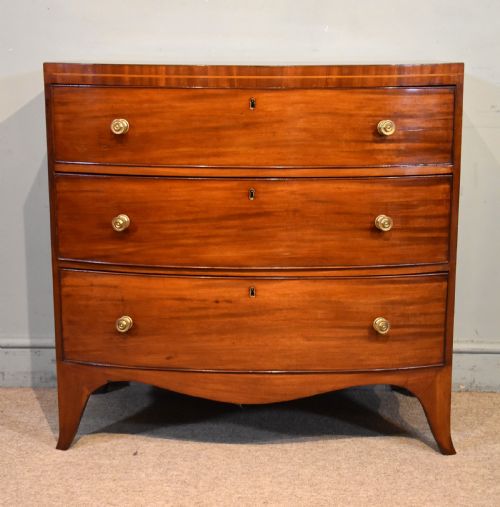 REGENCY PERIOD MAHOGANY BOW FRONTED CHEST OF DRAWERS