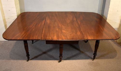 REGENCY PERIOD LARGE DROP LEAF MAHOGANY DINING TABLE