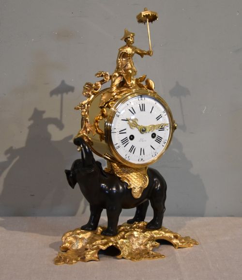 A FRENCH BRONZE AND ORMOLU MANTEL CLOCK OF ELEPHANT FORM - ADDITIONAL PHOTO 1