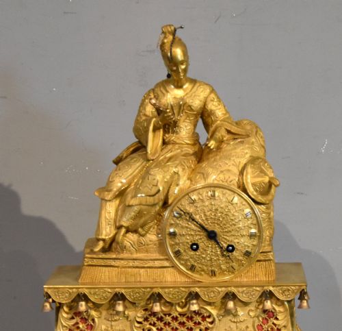 AN UNUSUAL FRENCH ORMOLU FIGURAL MANTEL CLOCK - ADDITIONAL PHOTO 1