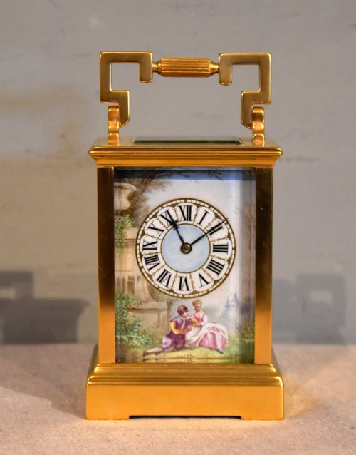 PORCELAIN MOUNTED CARRIAGE TIMEPIECE