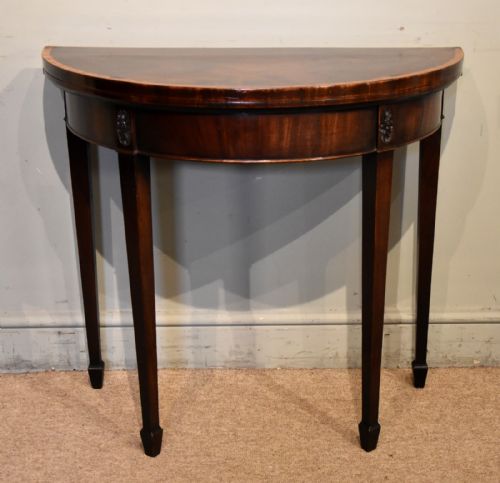 GEORGE III DEMI LUNE MAHOGANY CARD TABLE