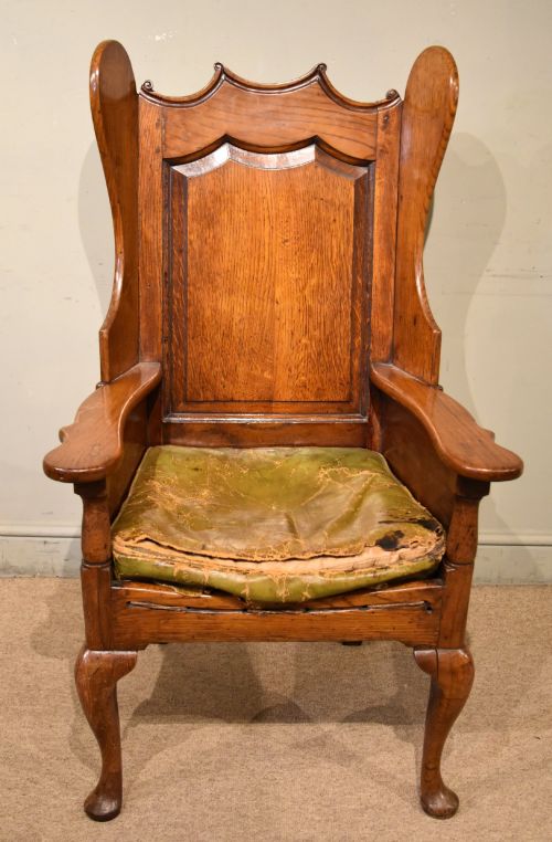 Rare mid 18th century oak wing back chair