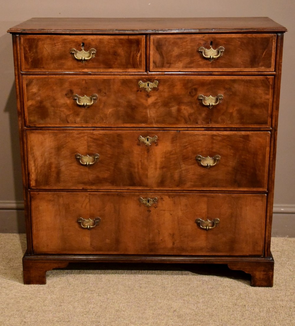 An Extremely Unusual Narrow George I Walnut Chest of Drawers